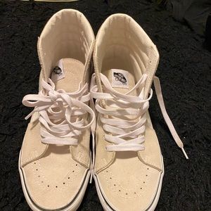 Cream color vans, vintage high top.
